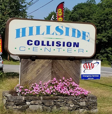 Hillside Collision Center with AAA Towing sign